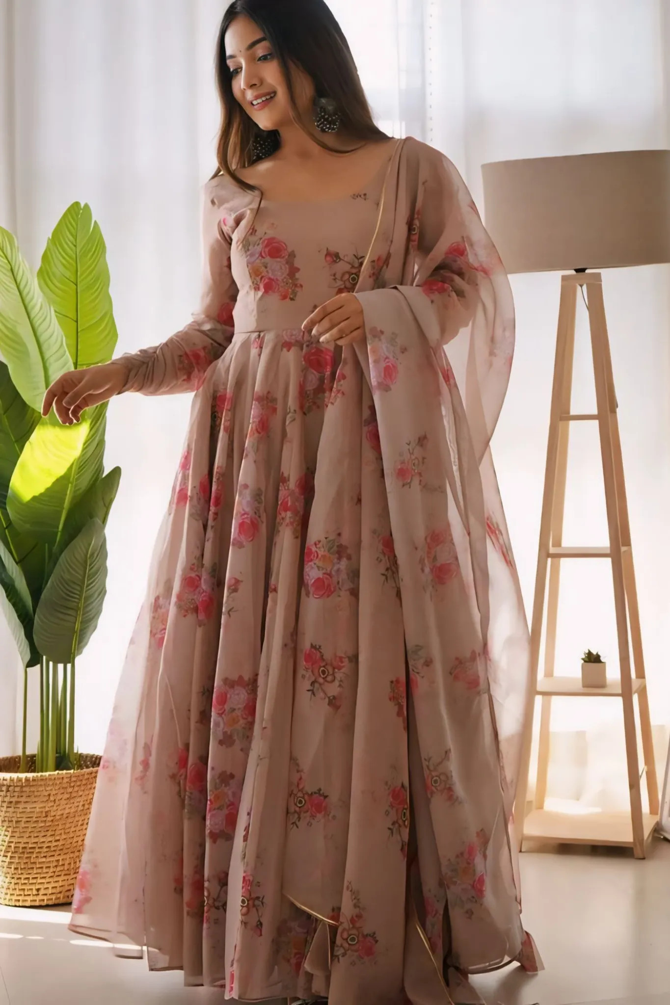 GRACEFUL ELEGANCE IN A FLORAL FLOWING GOWN WITH DUPATTA