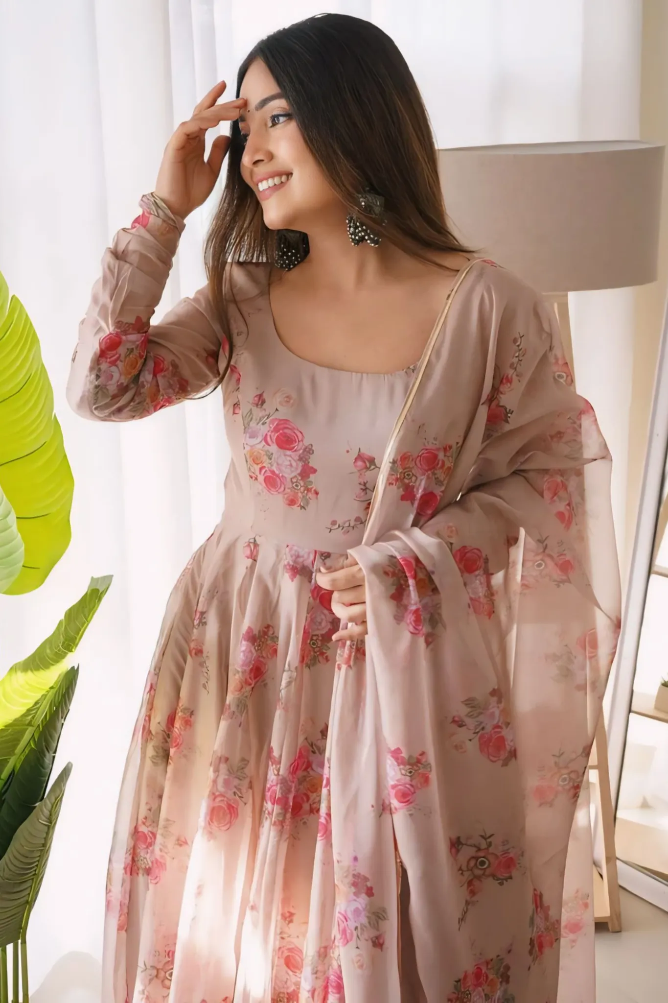 GRACEFUL ELEGANCE IN A FLORAL FLOWING GOWN WITH DUPATTA